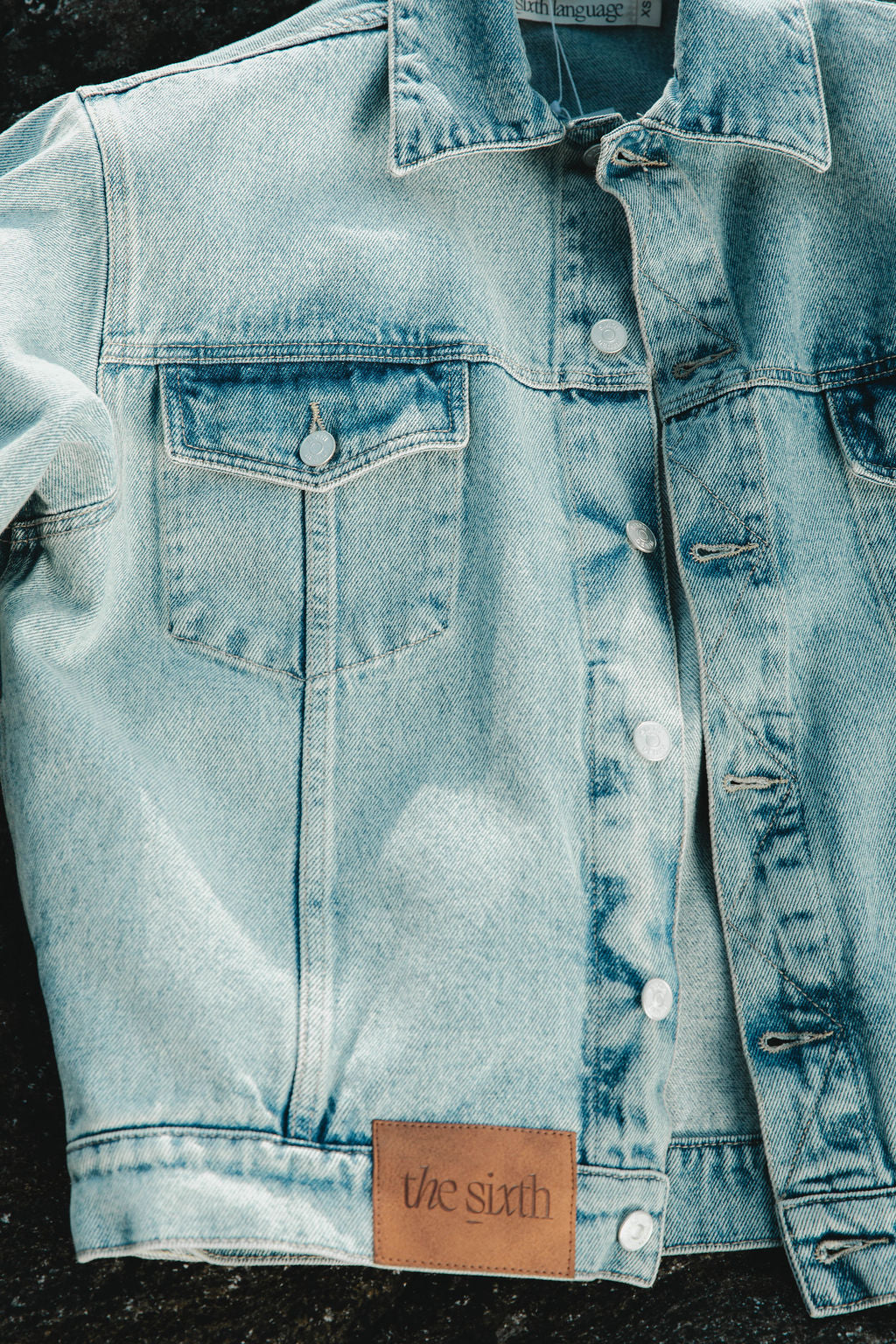 the blue denim jacket
