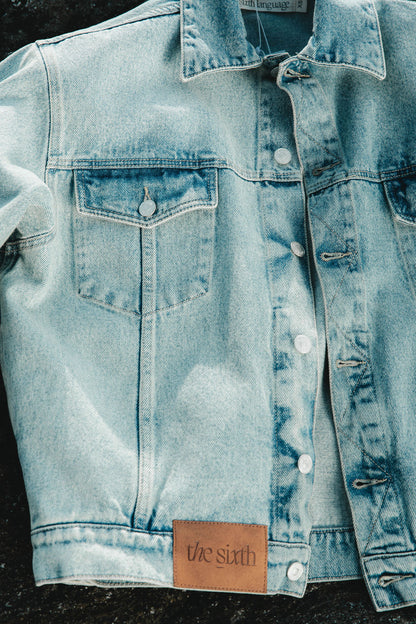 the blue denim jacket