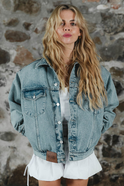 the blue denim jacket